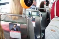 G4S – reklaam bussis, istmete seljatugedel